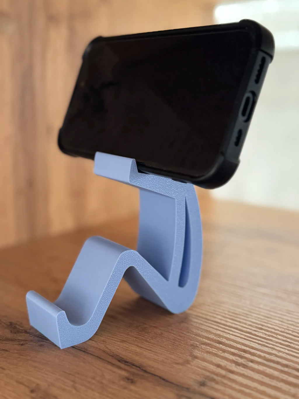 Sitting Man Phone Holder (designer photo)