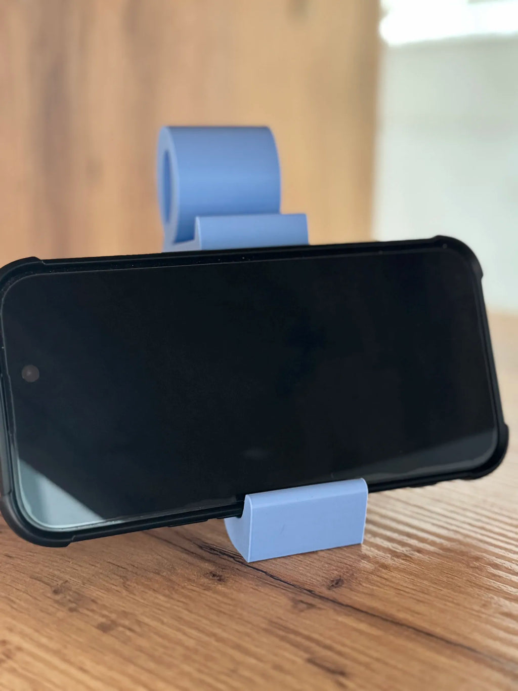 Sitting Man Phone Holder (designer photo)