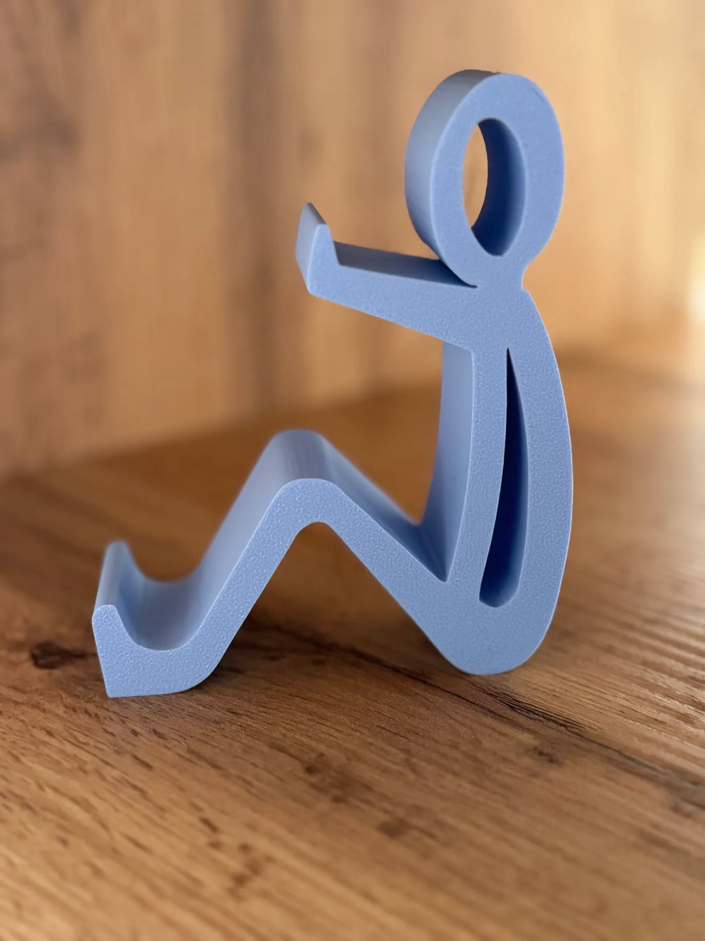 Sitting Man Phone Holder (designer photo)