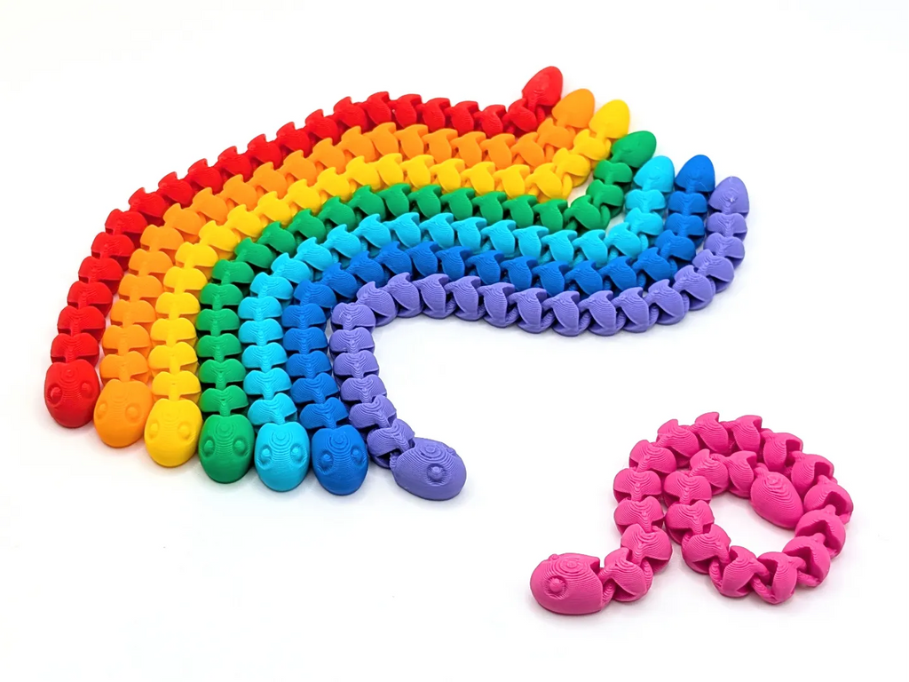 Cute Snakey fidgets in rainbow colours (designer photo)