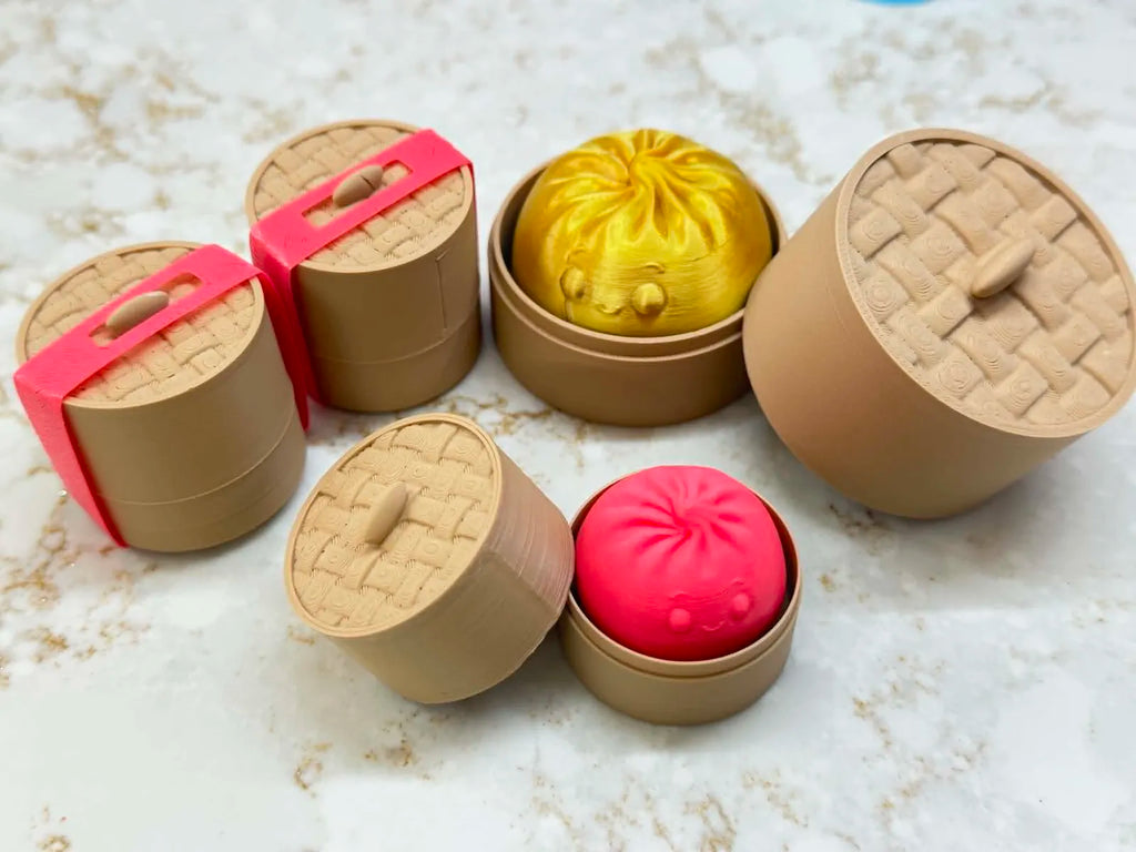 Squishy Dumpling Fidget Clicker (designer photo)